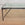 Mid Century Italian Tapered Iron Coffee Table with Nested Glass Top by Papperzini in the Manner of Giacometti