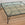 Mid Century Italian Tapered Iron Coffee Table with Nested Glass Top by Papperzini in the Manner of Giacometti