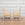 Pair of White Cerused Oak Arm Chairs with Carved Elements and Yellow Upholstery