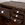 19th C. French Country Pine Cupboard with Weathered Dark Brown Paint and Porcelain Knobs