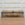 In Stock Monaco Bench with Blackened Base and Hair on Hide, 51"L