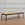 In Stock Monaco Bench with Blackened Base and Hair on Hide, 51"L