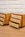 Pair of Modern Dressers with Leather Wrapped Drawers and Brass Feet