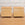 Pair of Modern Dressers with Leather Wrapped Drawers and Brass Feet
