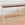 In Stock Cat's Cradle Console in Bone Powder Coat with Striped Fabric Top