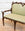 19th C. Carved Walnut Cattail Settee covered in Green Linen
