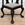 Pair of Spectacular 19th C. Anglo Indian Carved Ebony Roundabout Chairs