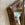 Faceted Mirror with Paint Decorated Trim and Distressed Glass Panels in the Manner of Serge Roche