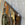 Faceted Mirror with Paint Decorated Trim and Distressed Glass Panels in the Manner of Serge Roche