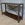 Industrial Two-Tiered Console in Steel with Vintage Leather Inserts