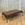 Manhattan Coffee Table with Poised Faux Porphyry Top