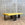 In Stock Offset Coffee Table with Blackened Base and Yellow Leather Top (SOLD)