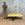 In Stock Offset Coffee Table with Blackened Base and Yellow Leather Top (SOLD)