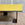 Offset Coffee Table with Blackened Base and Yellow Leather Top