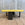 In Stock Offset Coffee Table with Blackened Base and Yellow Leather Top (SOLD)
