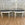 Two Demilune Consoles with Faux Soapstone Painted Tops