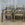 Pair of Painted Neoclassical Klismos Arm Chairs with Cane Seats