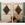 Pair of Antique Diamond-Form Giltwood Mirrors