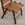 Two Carved Wood and Leather Dining Chairs
